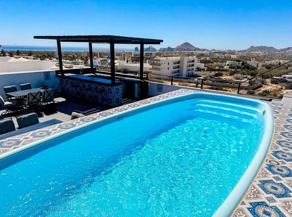 Los Cabos Cabo 10 Experience the perfect blend of luxury, comfort, and prime location in this beautifully designed 2-bedroom, 2-bathroom condo, ideally situated in the vibrant heart of Cabo San Lucas--just a few blocks from the Tourist Corridor and only 10 minutes from downtown. This spacious and stylish home-away-from-home features 2 inviting bedrooms, a bright open-concept living area with scenic – 101 Av. Crispin Ceseña, Cabo Corridor, BS