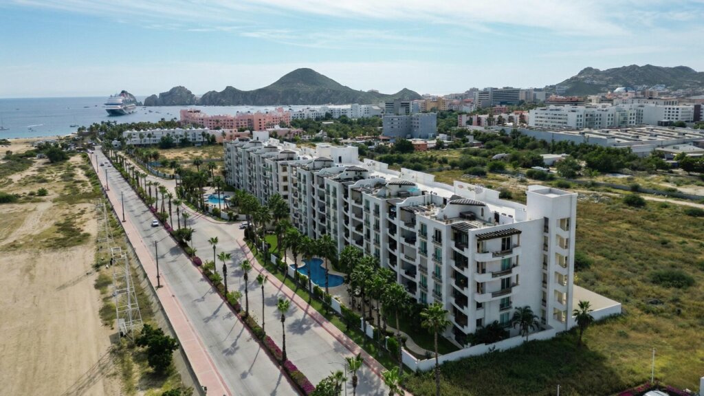 Los Cabos Puerta Cabos Village Amazing 2-Bedroom Condo | One Block from Medano Beach DONT MISS THIS OPPORTUNITY Exceptional 2-bedroom, 2 full bath condo just one block from Cabo's famous Medano Beach. Features a large private terrace, is fully furnished and equipped, and ready to enjoy or rent immediately.The spacious master suite offers an oversized bathroom with a hot tub jacuzzi. Includes 2 underground parking spaces and a private storage room.Community amenities include 24-hour security and two large swimming pools. Ideal for living or as a high-income vacation rental investment.Priced at – 208H Fte Hotel 8 Cascadas Medano, Cabo San Lucas, BS