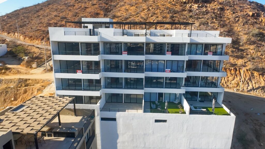 Los Cabos Breeze Of Cabo Discover the charm of Ground Floor Unit #102 at Breeze of Cabo, located in the sought-after Sunset area of Cabo San Lucas. This modern 2-bedroom, 2-bathroom condo features a spacious private patio — perfect for enjoying the warm weather and outdoor living. , the unit includes underground parking and access to a shared rooftop with a swimming pool and panoramic ocean – Breeze of Cabo 102, Cabo San Lucas, Cabo San Lucas, BS