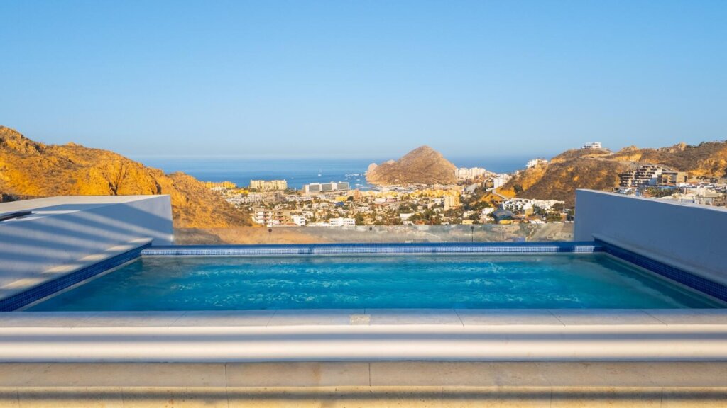 Los Cabos Breeze Of Cabo Discover this modern 2-bedroom, 2-bathroom condo located in the highly sought-after Sunset area of Cabo San Lucas. This corner unit offers maximum privacy with only one neighbor and features spacious windows and a cozy terrace where you can enjoy breathtaking sunrises and sunsets. The property includes underground parking, access to a shared rooftop with a swimming pool and panoramic ocean – Breeze of Cabo, Cabo San Lucas, Cabo San Lucas, BS