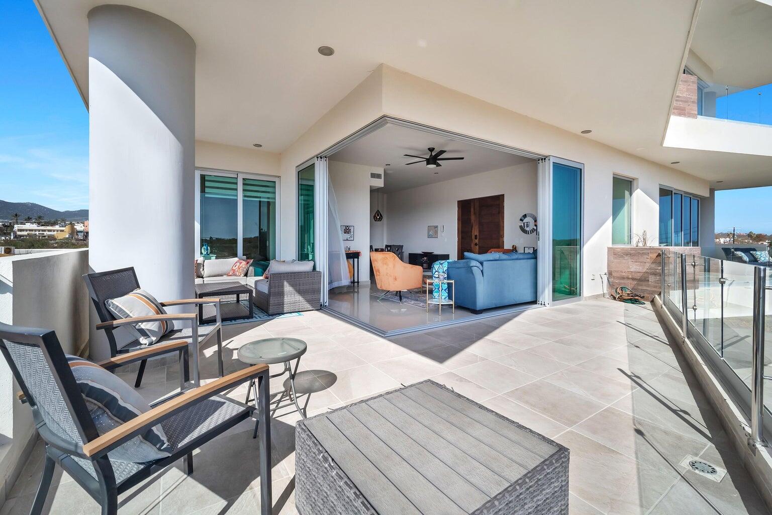 Los Cabos Camino Viejo Condominiums PRICE IMPROVEMENT!!!! Discover over 1,500 sq ft of modern, light-filled living just a 10-minute stroll from Medano Beach. This oceanside 2 bed/2 bath unit features high ceilings, quality finishes, and large wrap-around balcony perfect for indoor/outdoor living. Building amenities include underground parking with electrical outlet for your EV, elevator, storage unit, and security guard. Building is wheelchair accessible. Also included is a rooftop heated ocean- for sale