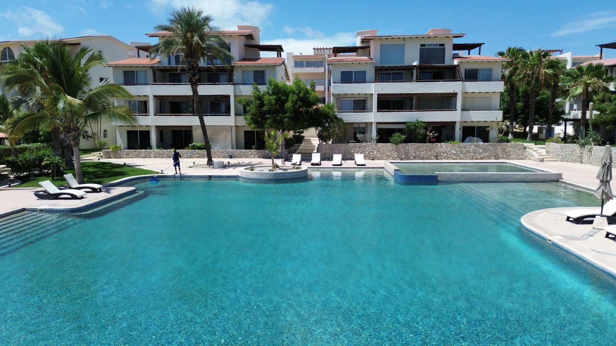 Los Cabos Tamar Welcome to Sol 202 — a beautifully furnished and decorated 2-bedroom, 2-bathroom condo located just 15 minutes from the heart of Cabo San Lucas. Situated on the second floor of the sought-after Tamar development, this turnkey residence offers stunning ocean and pool for sale