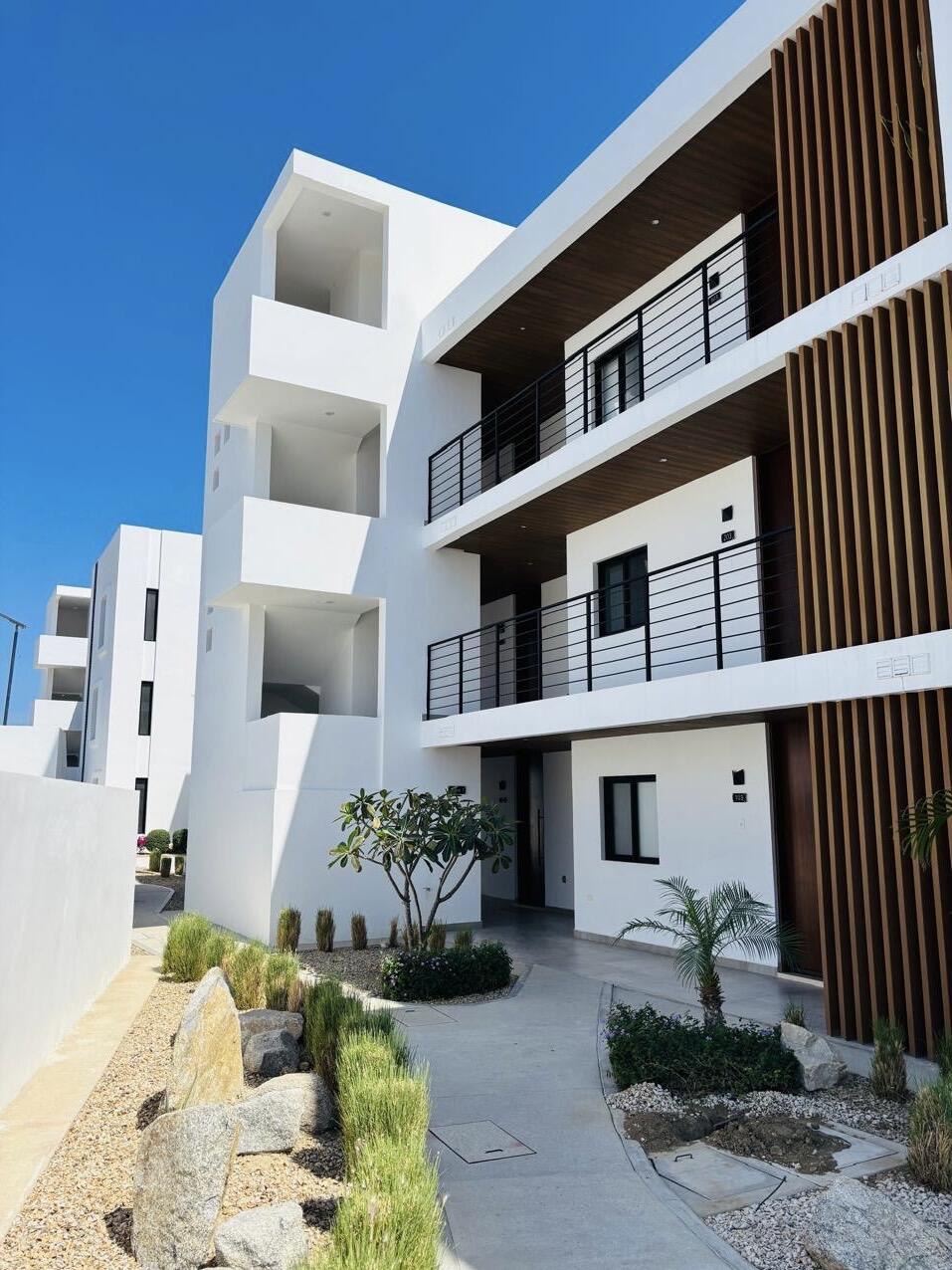 Los Cabos Cumbre Del Tezal Discover Yameto in Cabo San Lucas, a condominium that blends modern design, functionality, and comfort in every space. Featuring two bedrooms, two full bathrooms, and parking for two vehicles, it stands out for its high-quality finishes such as marble flooring and a fully equipped kitchen with a quartz countertop. It is delivered fully equipped with included appliances: a 5-burner electric ceramic cooktop, a three-door French Door refrigerator, and a microwave hood, giving you convenience and savings from day one. Additional features like a smart lock and a private terrace. Yameto elevates your lifestyle with amenities designed for maximum enjoyment: a swimming pool, gym, green areas, children's spaces, and a rooftop for gathering or relaxing. With 24/7 security and controlled access. for sale