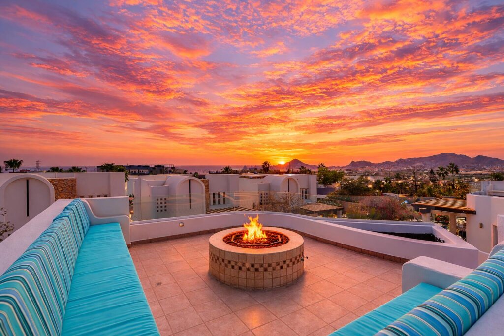 Los Cabos Toscana Residences Turnkey three-bedroom home in the well-kept, gated community of Toscana in El Tezal, minutes from downtown Cabo San Lucas and Medano Beach. Inspired by Mediterranean architecture and the Italian coast, Toscana features beautifully maintained desert landscaping with vibrant bougainvillea and colorful common areas. This fully furnished residence offers a main-floor primary suite, spacious guest bedrooms, and an open-concept kitchen with granite countertops and stainless appliances that flows to a private terrace. The rooftop showcases ocean and Arch for sale